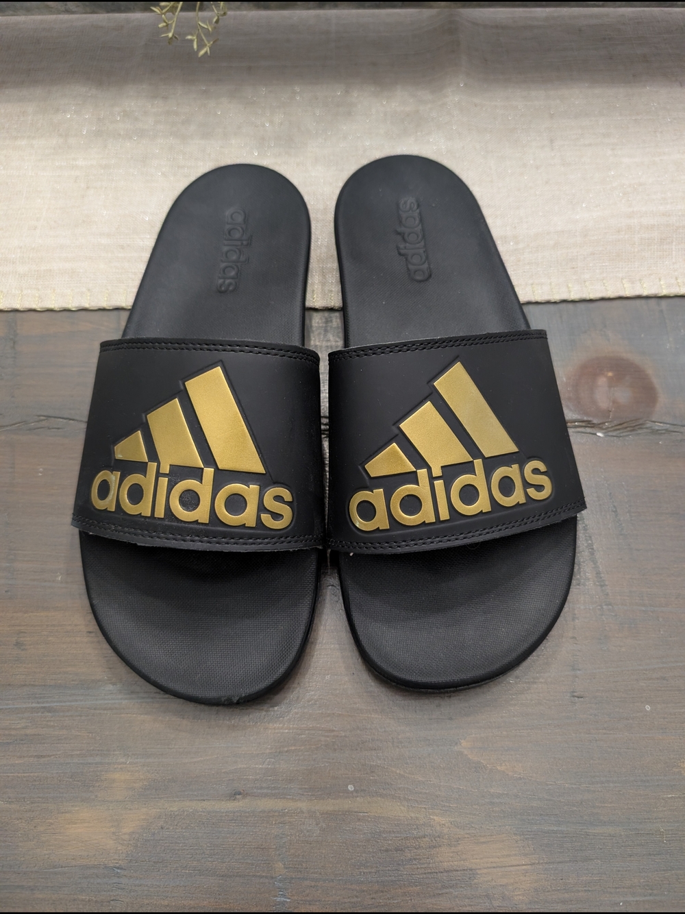 Adidas Black Slides with Gold Logo